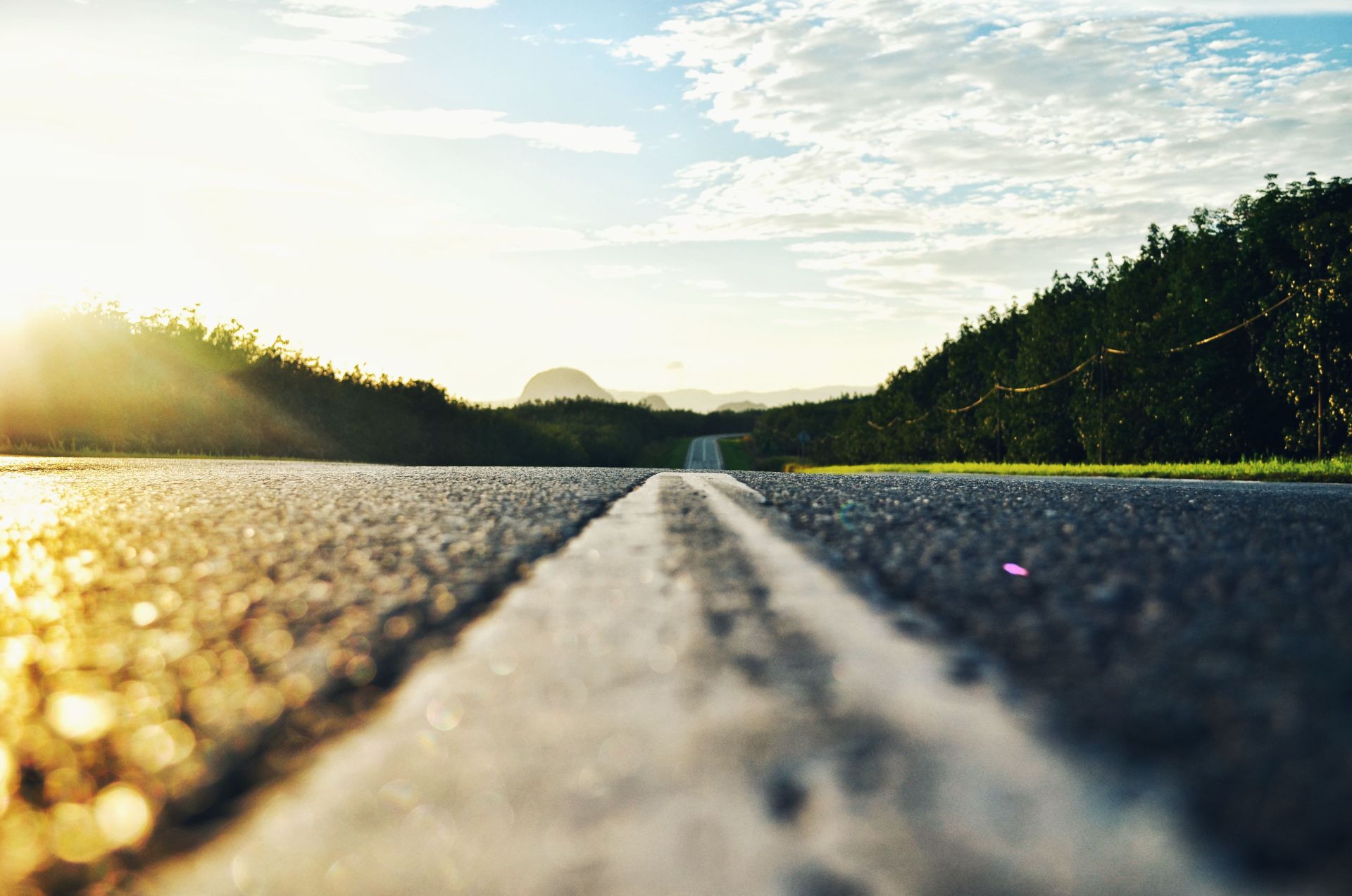 A closeup of a road, representing moving with children and mobility in family law