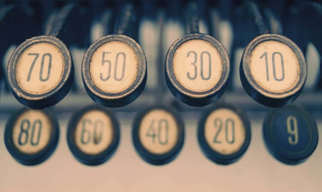 close-up photo of numbers on a type writer