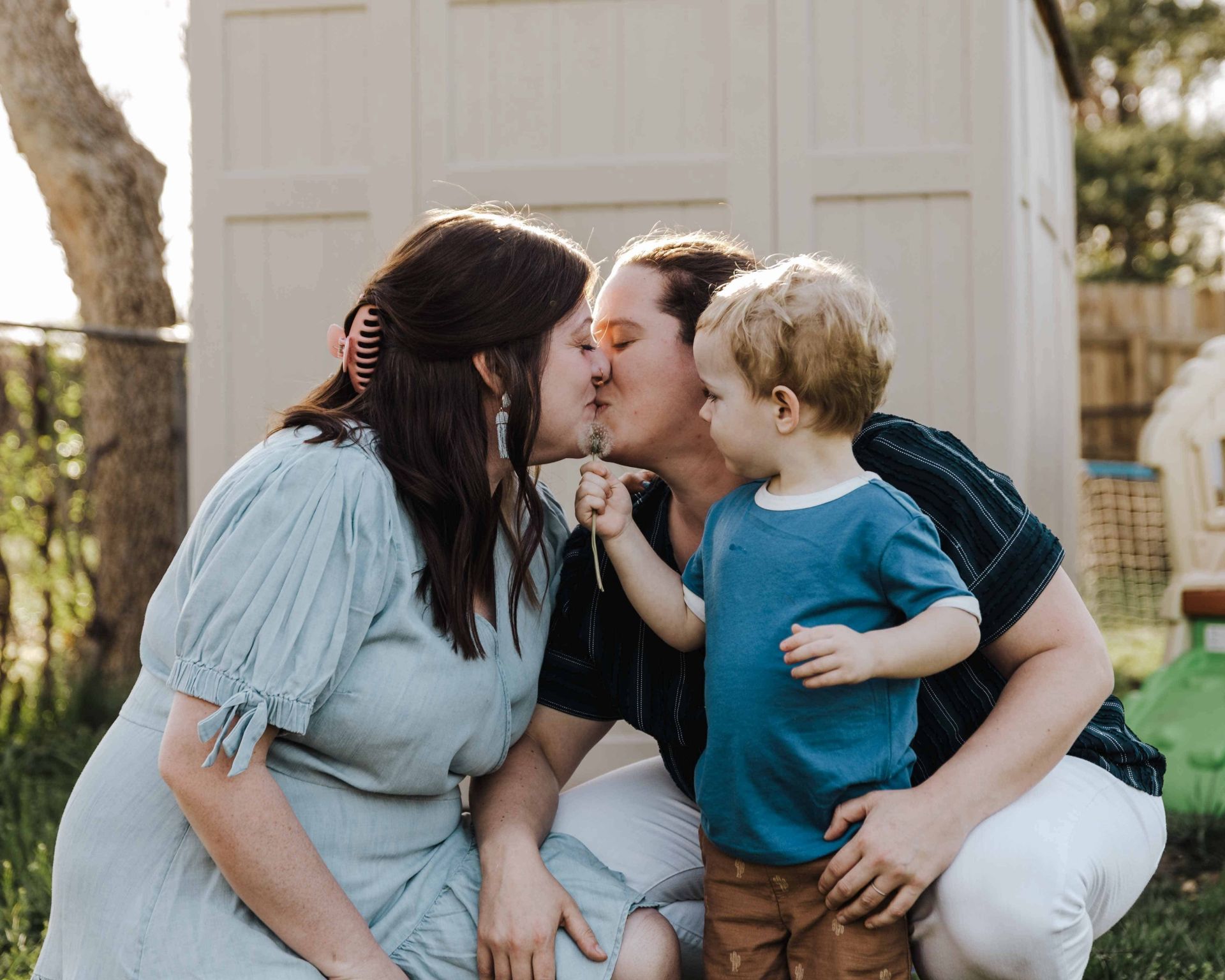 LGBTQ+ family with small child representing fertility law in Alberta